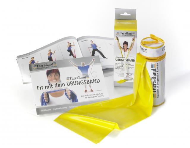 Theraband 2,5 m Original in Gelb neben Reißverschlusstasche und Verpackung mit Anleitung
