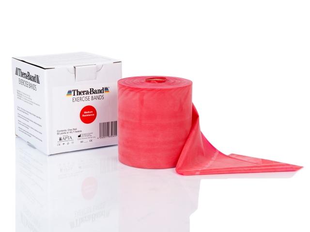 Theraband 45m Rolle Original Medium neben Verpackung in Rot