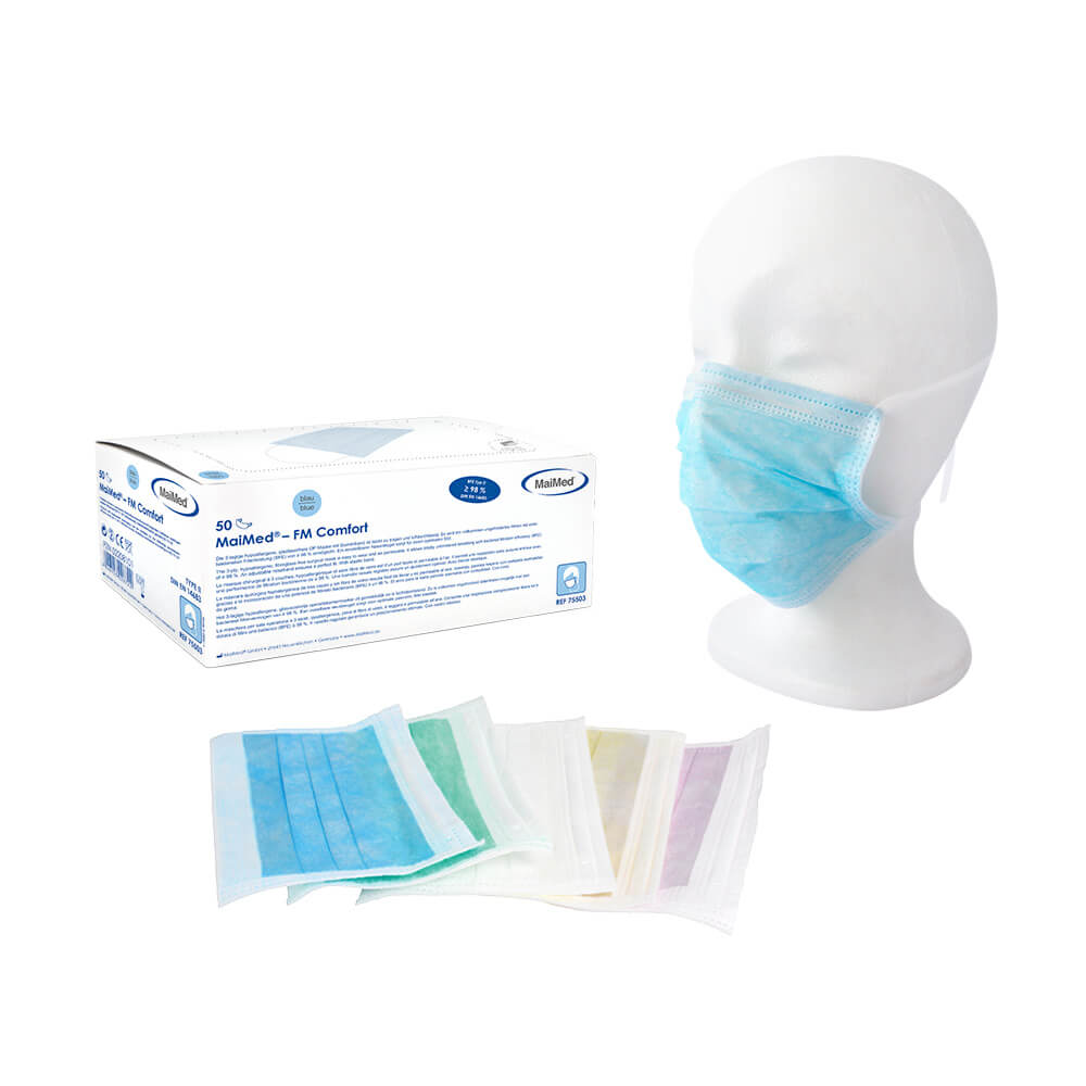 Einweg OP Maske MaiMed® FM Comfort an Gesichtsmodell neben Verpackung