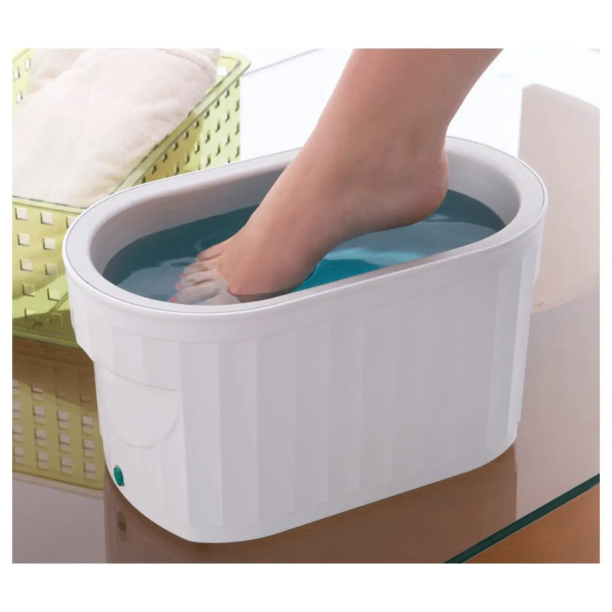 Paraffinbad Therabath PRO TB7 in Anwendung am Fuß
